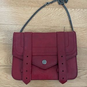 Proenza PS1 wallet on a chain red